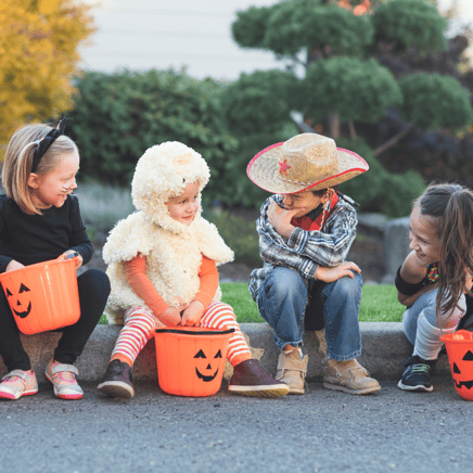 Children learning about the dangers of ticks and mosquitoes, highlighting safety education for Halloween.